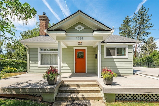 1728 S Adams St, Spokane, WA 99203 - bungalow-style home with a chimney, a deck, and a shingled roof