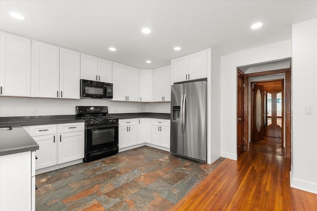 1728 S Adams St, Spokane, WA 99203 - kitchen featuring black appliances, dark countertops, white cabinetry, and recessed lighting
