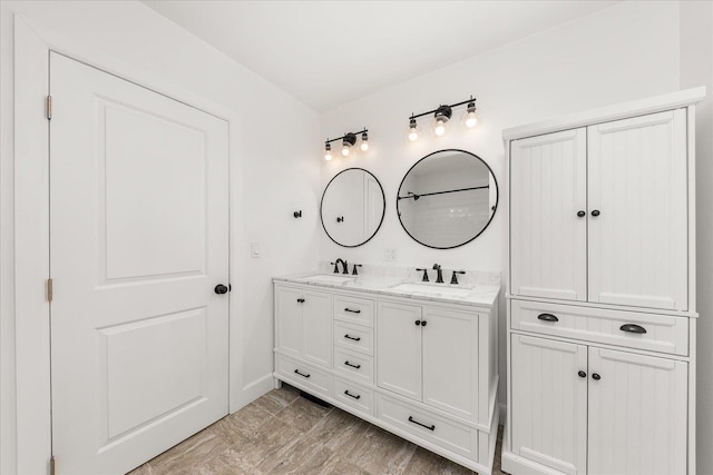 1728 S Adams St, Spokane, WA 99203 - full bathroom with double vanity and baseboards