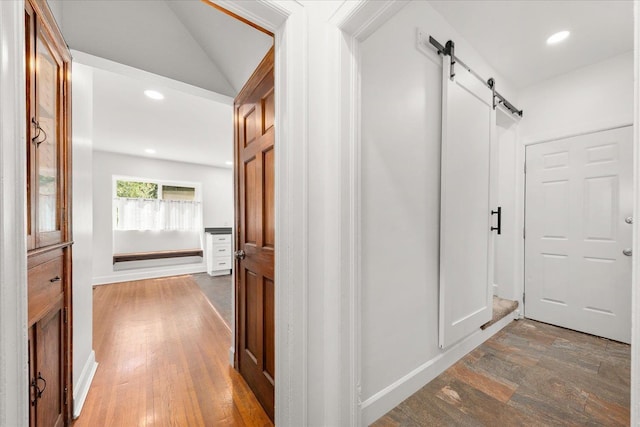 1728 S Adams St, Spokane, WA 99203 - corridor with a barn door, wood finished floors, and recessed lighting