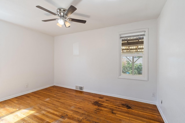 4615 N King Ct, Spokane, WA 99205 - empty room with wood finished floors and a ceiling fan