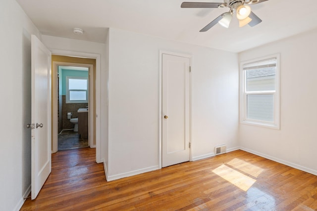 4615 N King Ct, Spokane, WA 99205 - unfurnished bedroom featuring light wood finished floors and a ceiling fan