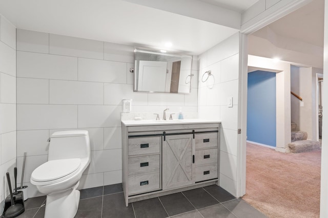 4615 N King Ct, Spokane, WA 99205 - bathroom with tile walls, vanity, and tile patterned floors