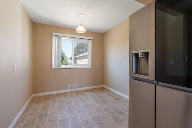 4615 N King Ct, Spokane, WA 99205 - unfurnished dining area with baseboards