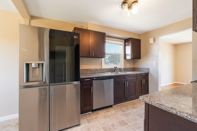 4615 N King Ct, Spokane, WA 99205 - kitchen with appliances with stainless steel finishes and dark brown cabinets