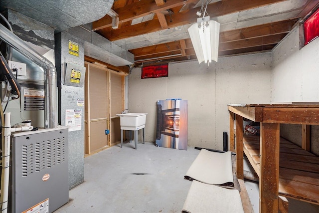1634 E Dalke Ave, Spokane, WA 99208 - unfinished below grade area with heating unit and a sink