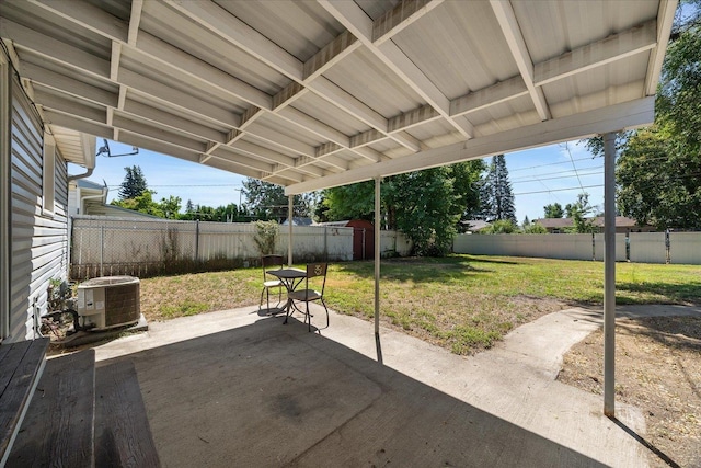 1634 E Dalke Ave, Spokane, WA 99208 - fenced backyard featuring a patio area and a storage shed