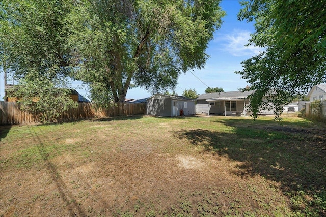 1634 E Dalke Ave, Spokane, WA 99208 - fenced backyard featuring a storage unit