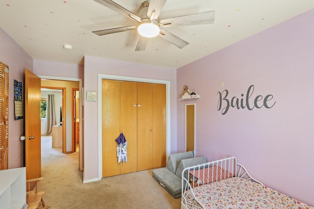 12837 E 37th Ln, Spokane Valley, WA 99206 - bedroom featuring light carpet, a closet, and a ceiling fan