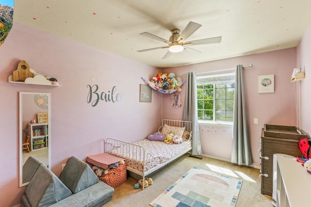12837 E 37th Ln, Spokane Valley, WA 99206 - bedroom with light colored carpet and a ceiling fan
