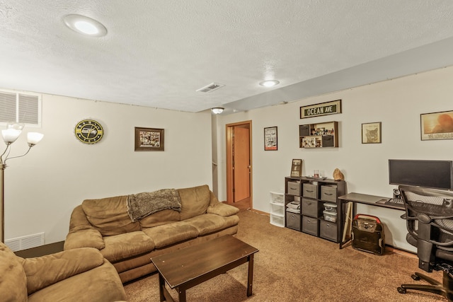 12837 E 37th Ln, Spokane Valley, WA 99206 - carpeted living room featuring a textured ceiling and a desk