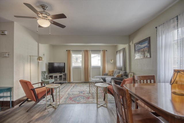 4028 N Post St, Spokane, WA 99205 - living room with wood finished floors, a textured wall, and a ceiling fan