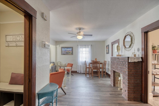 4028 N Post St, Spokane, WA 99205 - dining room with ceiling fan, wood finished floors, a textured ceiling, and a textured wall