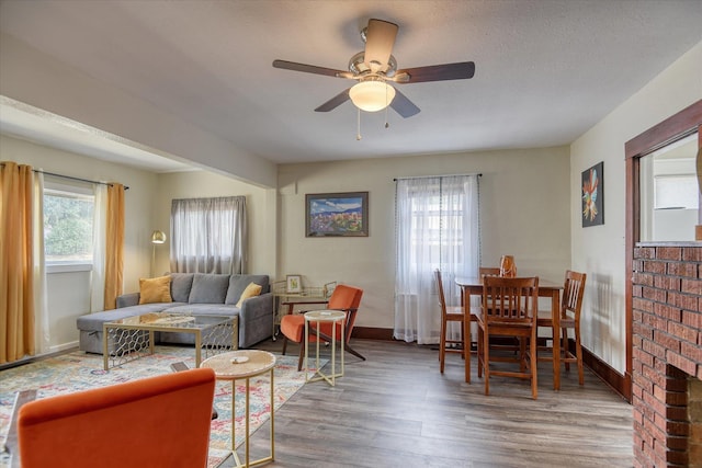 4028 N Post St, Spokane, WA 99205 - living area featuring wood finished floors and ceiling fan