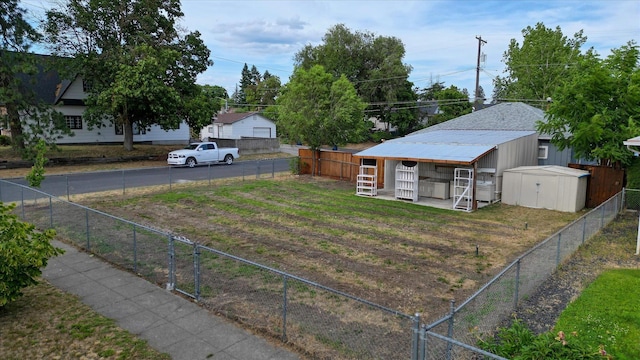 4028 N Post St, Spokane, WA 99205 - fenced backyard with an outbuilding