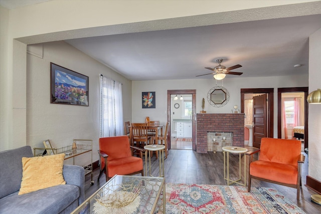 4028 N Post St, Spokane, WA 99205 - living room with plenty of natural light, wood finished floors, a brick fireplace, and ceiling fan