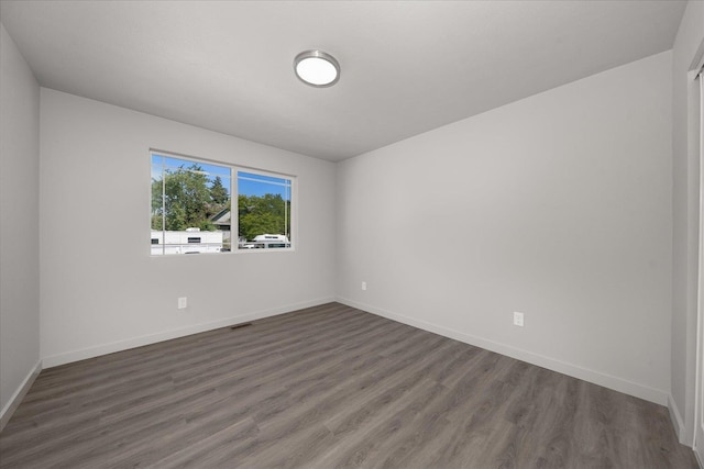 2912 E Wabash Ave, Spokane, WA 99217 - spare room with dark wood-style flooring and baseboards