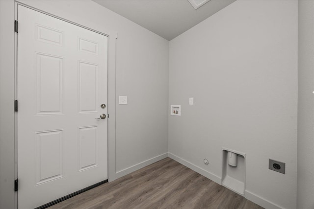 2912 E Wabash Ave, Spokane, WA 99217 - washroom featuring hookup for an electric dryer, wood finished floors, washer hookup, and hookup for a gas dryer