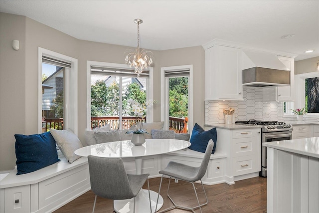 5203 S S Hogan Ct, Spokane, WA 99223 - dining area featuring a chandelier, dark wood-style floors, breakfast area, and recessed lighting