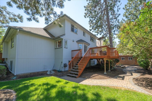 5203 S S Hogan Ct, Spokane, WA 99223 - rear view of house featuring a wooden deck, stairs, a yard, and roof with shingles