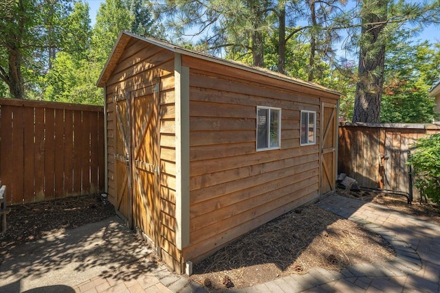 5203 S S Hogan Ct, Spokane, WA 99223 - view of shed featuring a fenced backyard