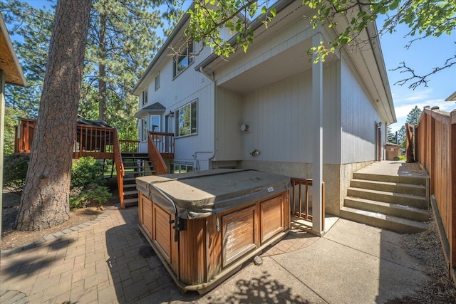 5203 S S Hogan Ct, Spokane, WA 99223 - view of patio / terrace featuring a hot tub, a deck, and stairway