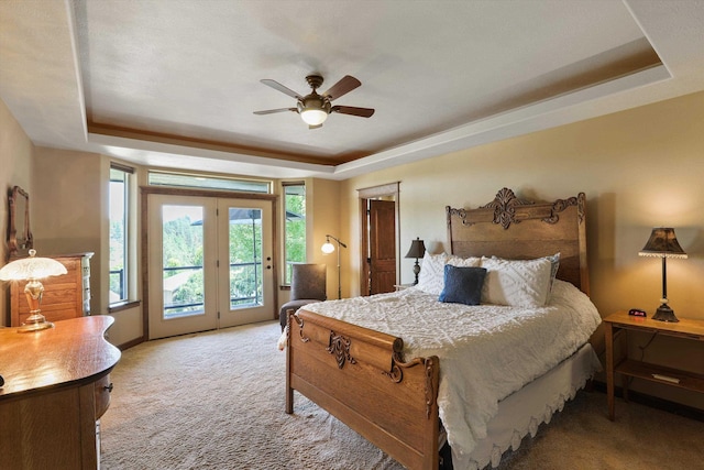 1604 N Rim View St, Spokane, WA 99224 - bedroom featuring a raised ceiling, light carpet, access to exterior, and ceiling fan
