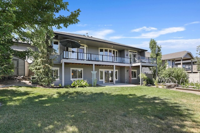1604 N Rim View St, Spokane, WA 99224 - back of house with a lawn, a balcony, and a patio