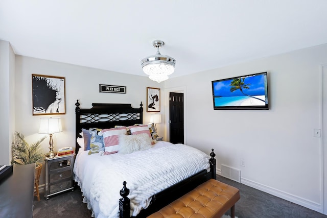 18017 N Lidgerwood Ct, Colbert, WA 99005 - bedroom with dark carpet and a chandelier