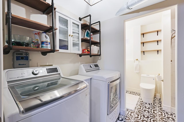 18017 N Lidgerwood Ct, Colbert, WA 99005 - laundry room with washing machine and clothes dryer and light tile patterned floors