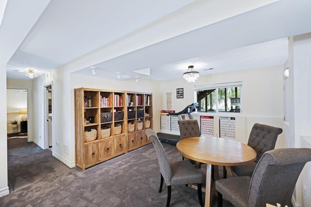 18017 N Lidgerwood Ct, Colbert, WA 99005 - dining room featuring carpet floors and a chandelier