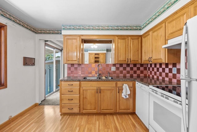11622 E 24th Ave, Spokane Valley, WA 99206 - kitchen featuring white appliances, light wood-style floors, decorative backsplash, ventilation hood, and dark stone countertops