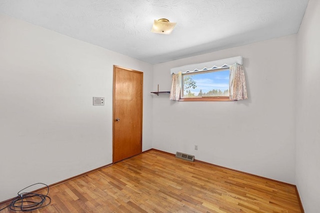 11622 E 24th Ave, Spokane Valley, WA 99206 - unfurnished room with light wood finished floors