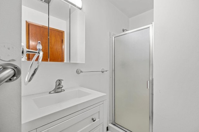 11622 E 24th Ave, Spokane Valley, WA 99206 - bathroom featuring a stall shower and vanity