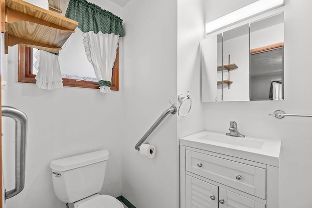 11622 E 24th Ave, Spokane Valley, WA 99206 - half bathroom featuring toilet and vanity