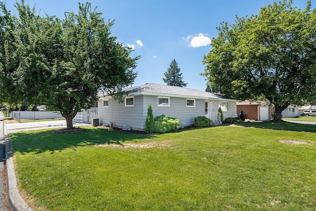 11622 E 24th Ave, Spokane Valley, WA 99206 - view of side of home featuring a garage and a central AC unit