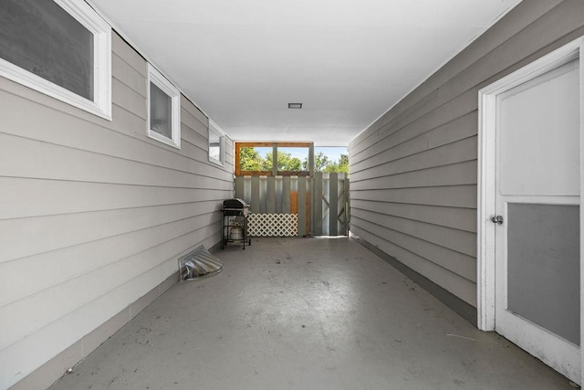 11622 E 24th Ave, Spokane Valley, WA 99206 - view of patio / terrace featuring grilling area and a carport