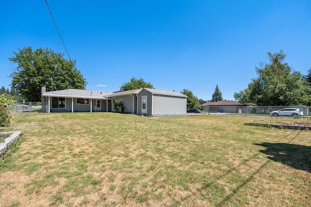 11622 E 24th Ave, Spokane Valley, WA 99206 - rear view of property with a chimney
