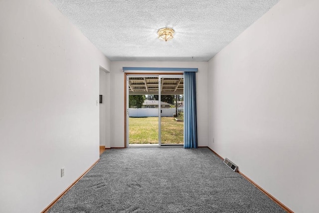 11622 E 24th Ave, Spokane Valley, WA 99206 - empty room with carpet floors and a textured ceiling