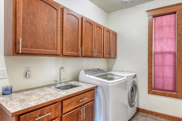 7302 N Quamish Dr, Spokane, WA 99208 - washroom featuring cabinet space and separate washer and dryer