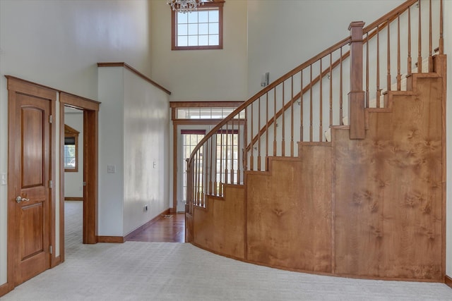 7302 N Quamish Dr, Spokane, WA 99208 - stairs with carpet flooring and a high ceiling