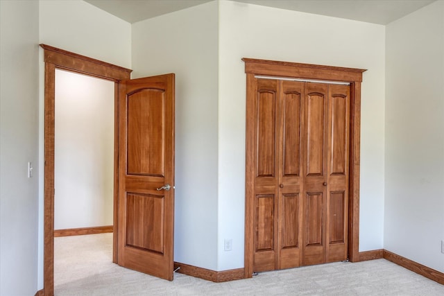 7302 N Quamish Dr, Spokane, WA 99208 - unfurnished bedroom with light colored carpet and baseboards