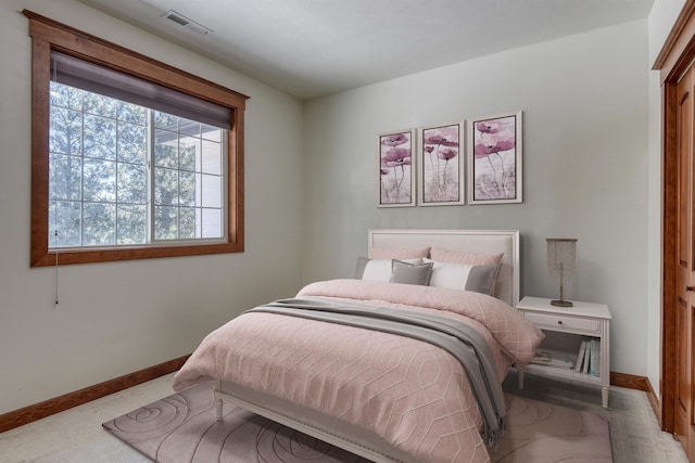 7302 N Quamish Dr, Spokane, WA 99208 - bedroom with baseboards and carpet flooring