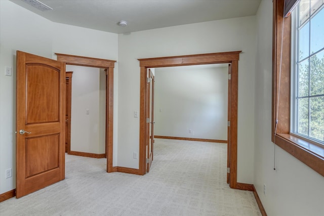 7302 N Quamish Dr, Spokane, WA 99208 - empty room featuring light carpet and a smoke detector