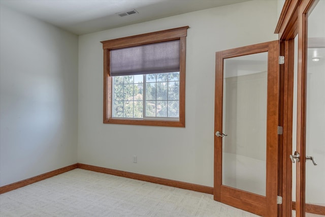 7302 N Quamish Dr, Spokane, WA 99208 - empty room with baseboards and light carpet