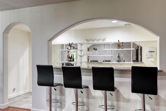 7302 N Quamish Dr, Spokane, WA 99208 - indoor dry bar with arched walkways