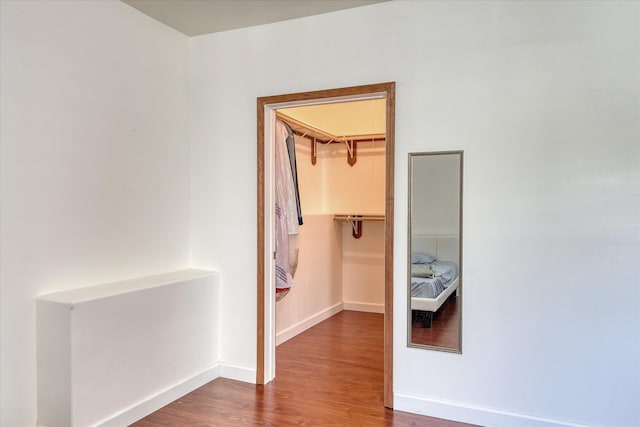7302 N Quamish Dr, Spokane, WA 99208 - hall with dark wood-style flooring and baseboards