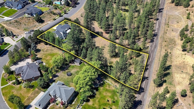 7302 N Quamish Dr, Spokane, WA 99208 - aerial view of residential area featuring property boundaries highlighted