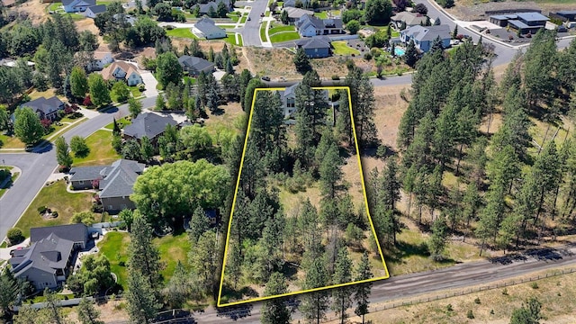 7302 N Quamish Dr, Spokane, WA 99208 - aerial perspective of suburban area featuring property parcel outlined