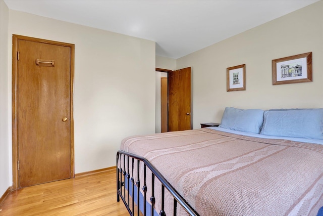 3526 W Hoffman Ave, Spokane, WA 99205 - bedroom with light wood-style flooring and baseboards